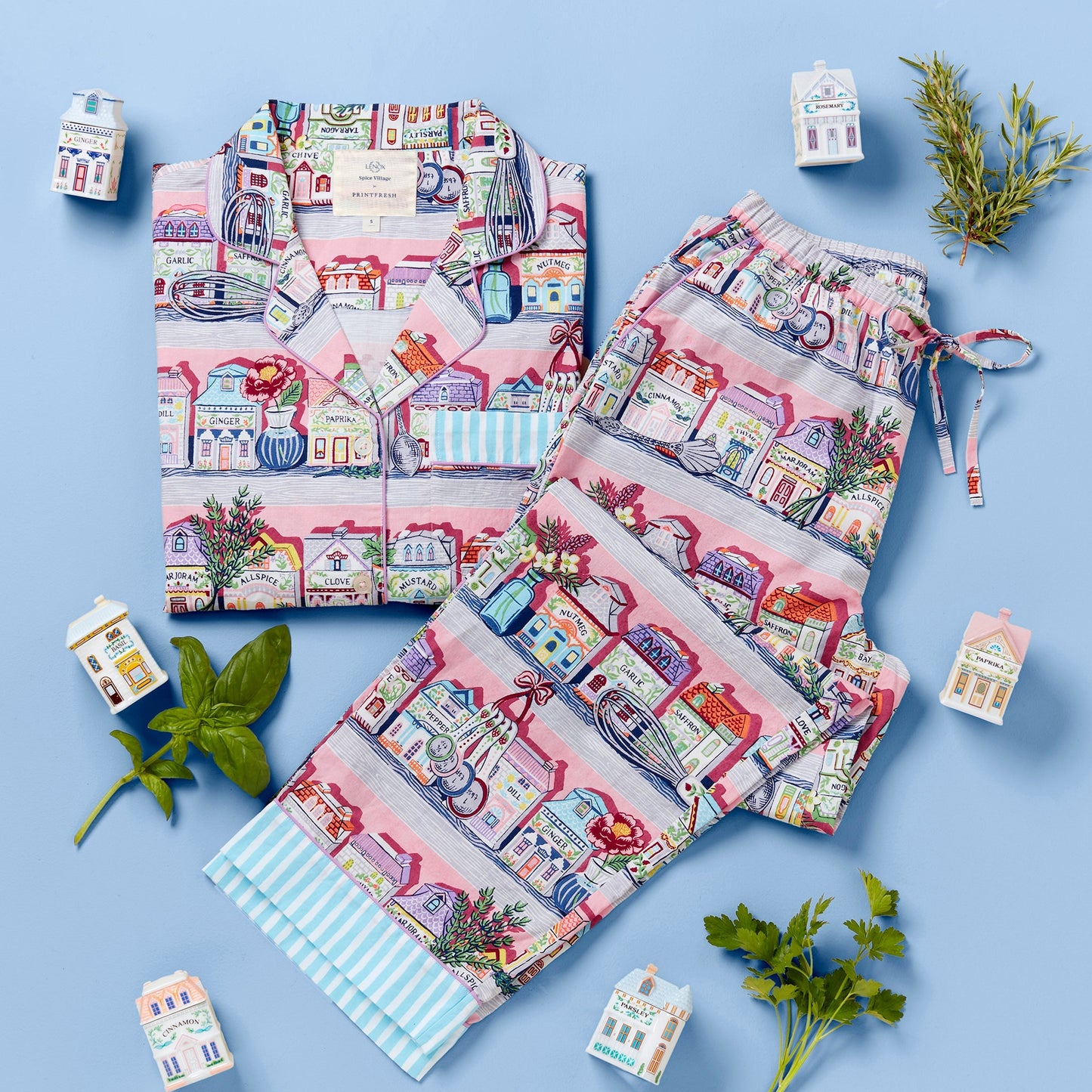Colorful fabric with house pattern on a blue background